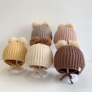 Все подходящие детские шапочки Осенне-зимние шерстяные Новые модные детские трикотажные грелки с двойным шариком Теплые